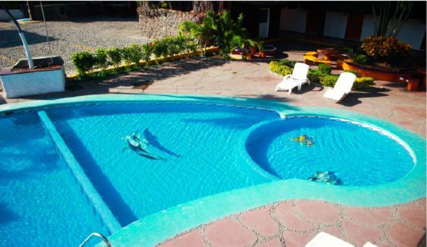 Hotel Gina Tecoman Bagian luar foto