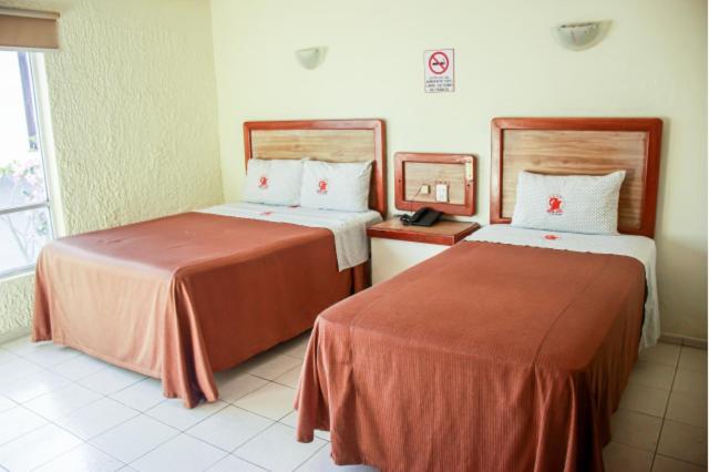 Hotel Gina Tecoman Bagian luar foto